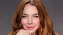 Gaya penampilan Lindsay Lohan sendiri baik saat santai ataupun jalani pemotretan kerap banjir pujian netizen. Rambut bervolume serta risan wajah sederhana ini disebut-sebut oleh netizen membuatnya semakin menawan. (Liputan6.com/IG/@lindsaylohan)