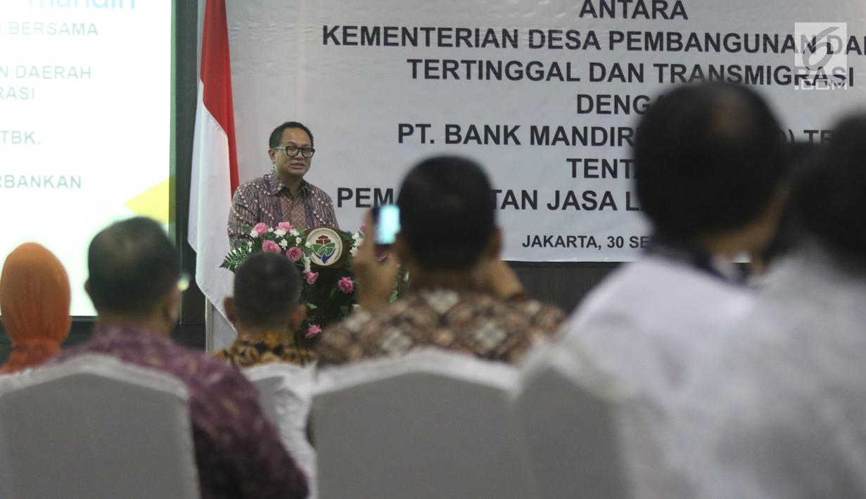 Dirut Bank Mandiri Kartika Wirjoatmodjo memberi sambutan dalam penandatanganan kerja sama Bank Mandiri dengan Kemendes PDTT di Kantor Kemendes PDTT, Jakarta, Senin (30/9/2019). Bank Mandiri mendukung Kemendes PDTT melalui layanan produk dan jasa perbankan. (Liputan6.com/Angga Yuniar)