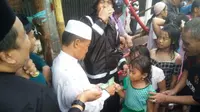 Tradisi Bagi-Bagi Uang Pengusaha Makassar di Pertengahan Ramadan
