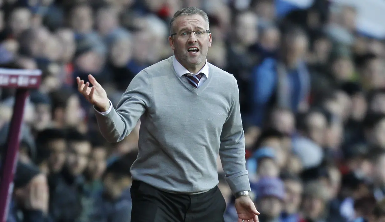 Pelatih Stoke City, Paul Lambert lahir di Glasgow 7 Agustus 1969 dan melakukan debut di Premier League pada 13 August 2011. (AFP/Ian Kington)