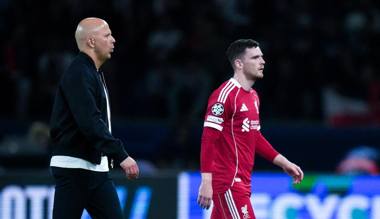 Slot pun lantas meminta para pendukung timnya untuk memadati Anfield dan memberi dukungan ke anak asuhnya. Baginya, pendukung The Reds bisa membantu para pemain untuk bermain agresif dan menurunkan mental bertanding lawan. (AP Photo/Thibault Camus)
