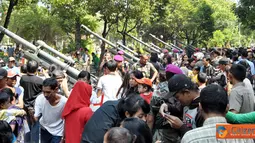 Citizen6, Jawa Timur: Kegiatan ini disambut dengan hangat oleh ratusan masyarakat yang memadati Lapangan Gedung Grahadi, Surabaya tersebut. (Pengirim: Budi Abdillah)