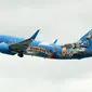 Pesawat Alaska Airlines dengan tema khusus dari salah satu film yang diproduksi Pixar Animation Studios lepas landas dari Bandara Internasional Seattle-Tacoma di Seattle pada 7 Oktober 2019. Pesawat Boeing 737-800 milik maskapai tersebut menampilkan tokoh dari Toy Story. (AP Photo/Ted S. Warren)