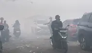 Napas Tersengal di Bawah Kepungan Asap TPA Jatiwaringin