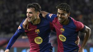 Duo bintang Barcelona, Pedri (kiri) dan Lamine Yamal. (AFP/Josep Lago)