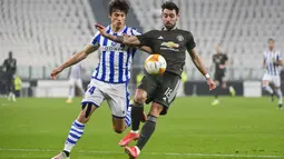 Bruno Fernandes kembali menjaringkan bola ke dalam gawang Real Sociead pada menit ke-57, dengan sepakan kaki kanan. (Foto: AP/LaPresse/Marco Alpozzi)