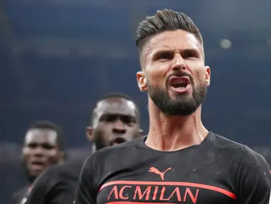 Pemain AC Milan Olivier Giroud melakukan selebrasi usai mencetak gol ke gawang Torino pada pertandingan Liga Italia Serie A di Stadion San Siro, Milan, Italia, 26 Oktober 2021. AC Milan menang 1-0. (AP Photo/Luca Bruno)