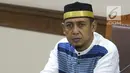 Terdakwa penyebaran berita bohong tentang 7 kontainer berisi surat suara Pemilu 2019 yang telah tercoblos, Bagus Bawana Putra menyimak keterangan Kepala Biro Hukum Sekjen KPU, Sigit Joyowardono saat sidang lanjutan di Pengadilan Negeri Jakarta Pusat, Kamis (11/4). (Liputan6.com/Helmi Fithriansyah)