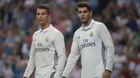 Dua pemain Real Madrid, Cristiano Ronaldo dan Alvaro Morata. (AFP/Curto de la Torre)