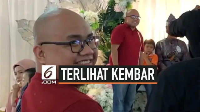 Seorang tamu undangan pernikahan di Selangor Malaysia terkejut saat bertemu dengan tamu lainnya di pelaminan. Mereka tampak kembar meski bukan saudara.