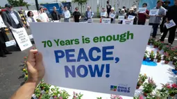 Korea Utara dan Korea Selatan, dua negara yang terlibat perang saudara berdarah selama 25 Juni 1950-27 Juli 1953, memperingatinya dengan cara masing-masing di tengah ketegangan kawasan yang justru makin intens. (AP Photo/Ahn Young-joon)