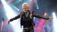 Vokalis Roxette Meninggal: Penampilan vokalis grup band Roxette Marie Fredriksson saat konser di Berlin, Jerman, 11 Juni 2011. Marie Fredriksson meninggal dunia pada 9 Desember 2019. (Britta Pedersen/dpa/AFP)