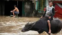 Banjir besar terjadi di sebagian Filipina setelah diterjang Badai Usman pada Sabtu, 29 Desember 2018 (AP/Simvale Sayat)
