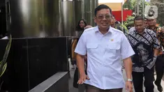 Kepala Badan Pangan Nasional (Bapanas) Arief Prasetyo Adi berjalan meninggalkan Gedung Merah Putih Komisi Pemberantasan Korupsi (KPK) Jakarta, Jumat (2/2/2024). (Liputan6.com/Herman Zakharia)