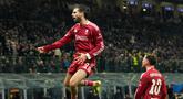 Pemain Liverpool, Dominik Szoboszlai, melakukan selebrasi setelah mencetak gol ke gawang Inter Milan pada matchday 6 fase grup Liga Champions 2025/2026 di Stadion Giuseppe Meazza, Rabu (10/12/2025) dini hari WIB. (AP Photo/Luca Bruno)