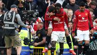 Manchester United berhasil meraih kemenangan penting saat menjamu Liverpool di Stadion Old Trafford, Minggu (3/5/2026) malam WIB. Kejar mengejar gol terjadi, namun gol Kobbie Mainoo memastikan tiga poin krusial buat Setan Merah. (AFP/Darren Staples)