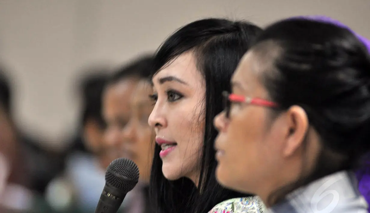 Mantan Wakil Sekjen Demokrat, Angelina Sondakh hadir di Pengadilan Tipikor, Jakarta, Kamis (14/8/14). (Liputan6.com/Miftahul Hayat)