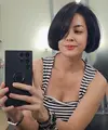 Lulu memilih memotong rambut hitamnya menjadi pendek model bob di bawah kuping. [@lutob]