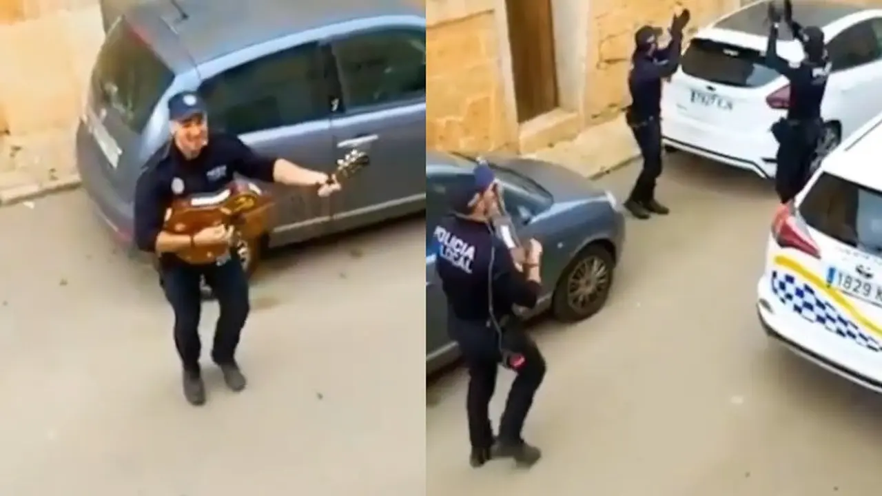 polisi spanyol hibur warga saat patroli