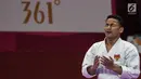 Karateka Indonesia, Ahmad Zigi Zaresta, berdoa usai tampil pada nomor kata cabang karate Asian Games XVIII di JCC Senayan, Jakarta, Sabtu (25/8/2018). Dirinya berhasil meraih medali perunggu. (Bola.com/Vitalis Yogi Trisna)