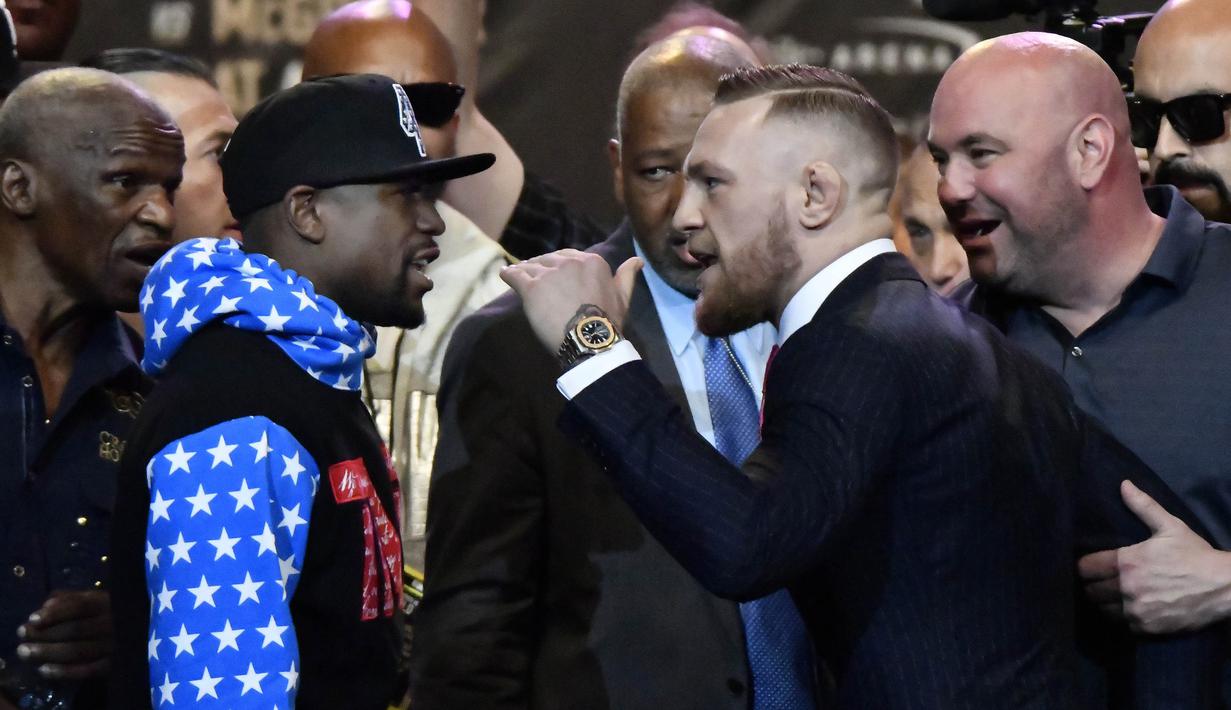 Sadar akan keadaan ini, McGregor berlatih keras hingga Agustus. Mantan juara dua kelas UFC itu melakukan sparring bersama John Kavanagh. (AFP/Gene Blevins)