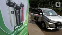 Mitra Driver GoCar menunjukkan pembersih udara atau air purifier di Jakarta, Rabu (21/04/2021). Gojek telah melengkapi 8000 unit air purifier Sharp terbanyak pada GoCar di Jabodetabek untuk menjaga kualitas udara pada kendaraan dan kenyamanan penumpang. (Liputan6.com/HO/Ading)