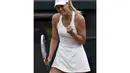 Petenis Rusia, Maria Sharapova, hanya butuh waktu sekitar satu jam untuk menundukkan perlawanan Timea Bacsinszky di babak kedua turnamen Wimbledon, (26/6/2014). (REUTERS/Toby Melville)