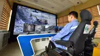 Pekerja mengoperasikan ekskavator nirawak menggunakan sistem kendali jarak jauh di Tambang Sandaozhuang milik China Molybdenum Co., Ltd., Luanchuan, Provinsi Henan, China, 12 Agustus 2020. Sejak 2019, teknologi 5G telah diterapkan dalam operasional Tambang Sandaozhuang. (Xinhua/Li Jianan)