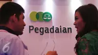 Pegadaian ikut berpartisipasi di acara Indonesia Banking Expo (IBEX) 2015 di JCC, Jakarta, Kamis (10/9/2015). Sejumlah bank menawarkan beragam fasilitas untuk menarik pengunjung menabung di tempatnya. (Liputan6.com/Angga Yuniar)