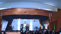 Menteri Agama, Yaqut Cholil Coumas, saat memberikan sambutan di acara pembukaan Bimbingan Teknis PPIH di Asrama Haji, Pondok Gede, Jakarta, Selasa (17/5/2022). (Merdeka.com)