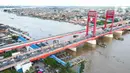 Foto udara menunjukkan Jembatan Ampera, Palembang, Sumatera Selatan, Minggu (12/3/2023). Target ini naik dari capaian kunjungan wisatawan pada 2022, yakni 1,5 juta wisatawana.(Liputan6.com/Herman Zakharia)