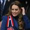 Kate Middleton di pertandingan rugby dengan mengenakan mantel Alexander McQueen. (dok. Glyn KIRK / AFP)