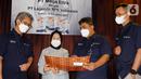 (ki-ka) Direktur PT Mega Eltra Indrajaya, Direktur PT Lagenda NPK Indonesia Fadilawaty, Direktur Utama PT Mega Eltra Hilman Taufik dan Direktur Dundi Insan berbincang usai penandatanganan kerja sama untuk menyediakan kebutuhan pupuk majemuk di Jakarta, Kamis (18/11/2021). (Liputan6.com/HO/Dayat)