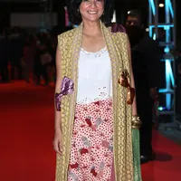 Rasa penasaran juga dirasakan oleh artis senior, Cut Mini Theo (42). Ia rela ke Yogyakarta demi menghadiri penayangan perdana film AADC2. (Andy Masela/Bintang.com)