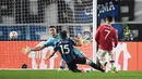 Ketika pertandingan tampak akan berakhir dengan kemenangan untuk Atalanta, Ronaldo muncul sebagai penyelamat Manchester United. Bola hasil tendangan keras Ronaldo pada menit ke-90+1 menghujam deras gawang Atalanta. (AFP/Marco Bertorello)