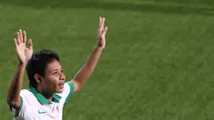 Ekspresi Evan Dimas Darmono setelah mencetak gol ke gawang Singapura U-23 dalam penyisihan Grup A Sepakbola SEA Games 2015 di Stadion Jalan Besar, Singapura. Kamis (11/6). (Bola.com/Arief Bagus)