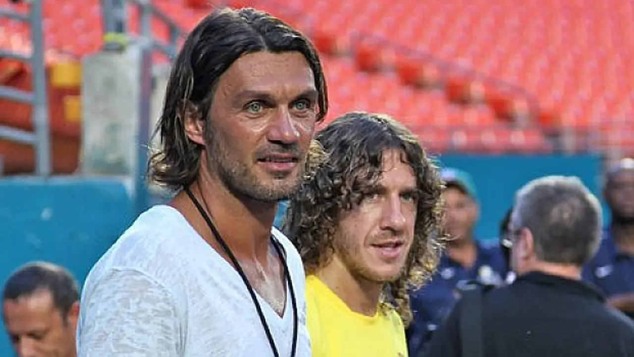 Charles Puyol bersama Paolo Maldini