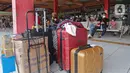 Calon penumpang menunggu pemberangkatan di Terminal Kampung Rambutan, Jakarta, Selasa (21/12/2021). Kepala Terminal Kampung Rambutan Yulza Ramadhoni mengatakan, penumpang bus meningkat 10 persen menjelang Natal 2021 dan Tahun Baru 2022. (Liputan6.com/Hermann Zakharia)
