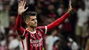 Striker baru AC Milan, Alvaro Morata langsung mencetak gol pada pekan pertama Serie A 2024/2025 saat timnya bermain imbang 2-2 dengan tamunya Torino (17/8/2024). Pemain asal Spanyol berusia 31 tahun ini didatangkan dari klub Spanyol, Atletico Madrid dengan mahar 13 juta euro. (AFP/Piero Cruciatti)