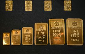 Harga emas Antam hari ini memecahkan rekor sebelumnya atau tertinggi dalam sejarah. (Juni KRISWANTO/AFP)
