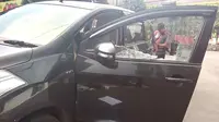 Pengendara mobil di Kota Malang, Jawa Timur, harus mewaspadai kejahatan dengan modus pecah kaca (Zainul Arifin/Liputan6.com)