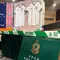 Otoritas bea cukai Hong Kong memamerkan jersey asli dan palsu saat konferensi pers di kantor pusatnya, North Point, Hong Kong Kamis, 11 Juni 2026. (AP Photo/Kanis Leung)