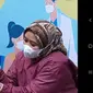 Seorang peserta vaksinasi dari kalangan ibu hamil kota Tasikmalaya, Jawa Barat tengah mengikuti program vaksinasi berhadiah layana USG kandungan secara gratis. (Liputan6.com/Jayadi Supriadin)