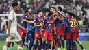 Laga final Piala Super Spanyol digelar di King Abdullah Sports City Stadium pada Minggu 11 Januari 2026 waktu setempat atau Senin 12 Januari 2026 dini hari WIB. Tampak dalam foto, para pemain FC Barcelona merayakan kemenangan pertandingan final Piala Super Spanyol melawan Real Madrid di King Abdullah Sports City Stadium, Jeddah pada Minggu 11 Januari 2026 waktu setempat atau Senin 12 Januari 2026 dini hari WIB. (Fadel SENNA/AFP)