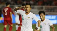 Gelandang Timnas Indonesia U-22, Sani Rizki, merayakan gol yang dicetaknya ke gawang Vietnam U-22 pada laga SEA Games 2019 di Stadion Rizal Memorial, Manila, Minggu (1/12). (Bola.com/M Iqbal Ichsan)