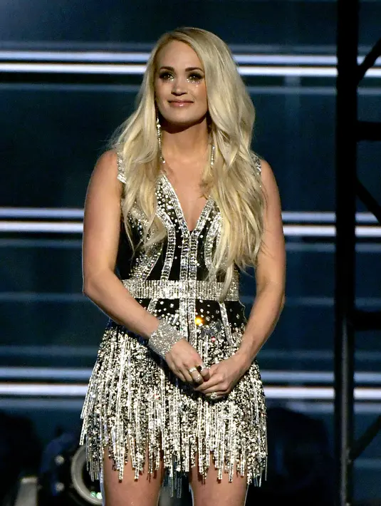 Tak bisa dipungkiri bahwa jadwal keduanya sangat padat dan mereka merasa kesulitan untuk mengurus anak pertama. (ETHAN MILLER  GETTY IMAGES NORTH AMERICA  AFP)