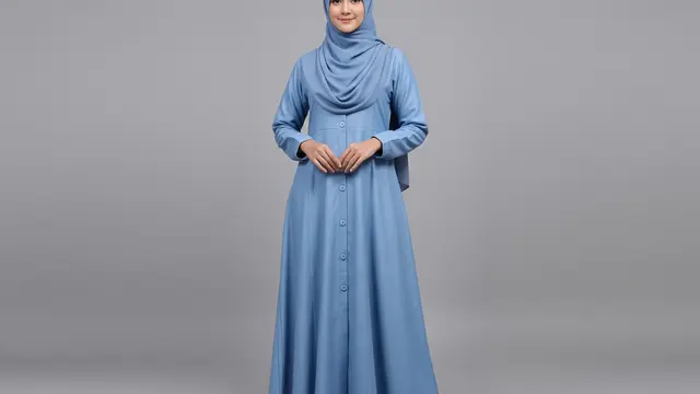 Model Gamis Bahan Toyobo dengan Kancing Depan dan Potongan A-line Santai
