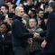 Manajer Manchester City, Pep Guardiola (kiri), berjabat tangan dengan pelatih interim Manchester United, Michael Carrick, seusai pertandingan Liga Inggris di Old Trafford, Manchester, Sabtu (17/1/2026).  (Darren Staples / AFP)