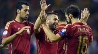 (From L to R) Spain's Sergio Busquets, Jordi Alba and Juanfran Torres celebrate a goal during their Euro 2016 Group C qualification soccer match against Luxembourg in Logrono, Spain October 9, 2015. REUTERS/Vincent West