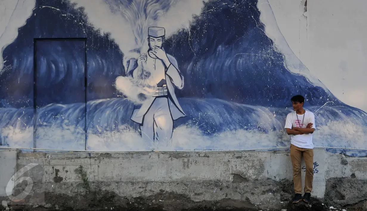 Karya yang dipamerkan pada Pameran Jakarta Biennale fokus pada permasalahan ekonomi, sosial, lingkungan dan dinamika masyarakat saat ini, Jakarta, Sabtu (14/11/2015). Pameran ini diikuti seniman dari dalam dan luar negeri. (Liputan6.com/ Gempur M Surya)